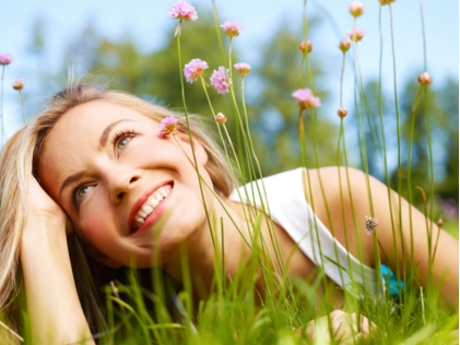 healthy-woman-grass-flowers